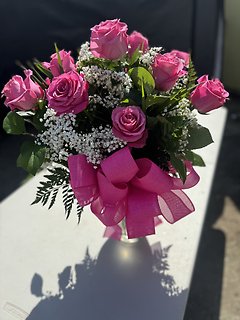 one dozen pink roses